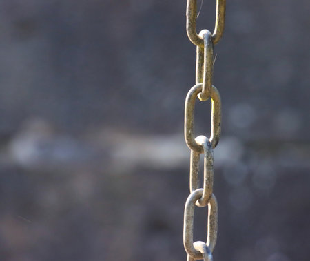 chain on the ground, closeup of photo with shallow depth of fieldの写真素材