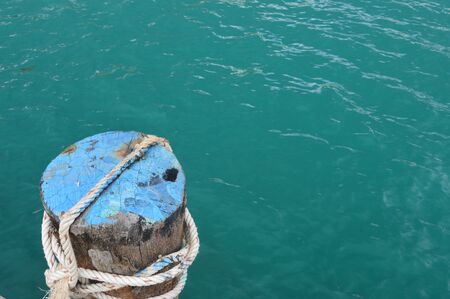 wood and rope in the oceanの写真素材