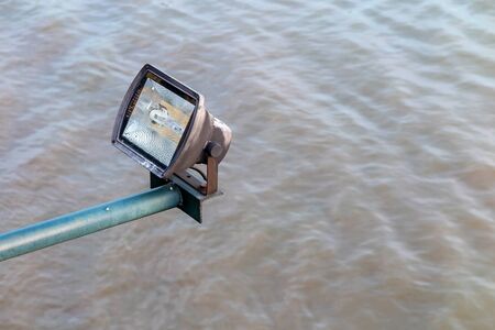 Spot light on the water river background, off switch