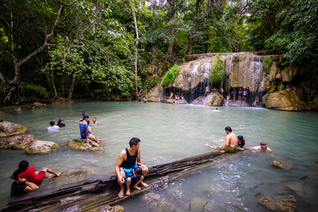 KANCHANABURI, THAILAND - SEPTEMBER 6, 2017 : People swimming in lagoon of Erawan waterfall in Kanchanaburi Thailandのeditorial素材