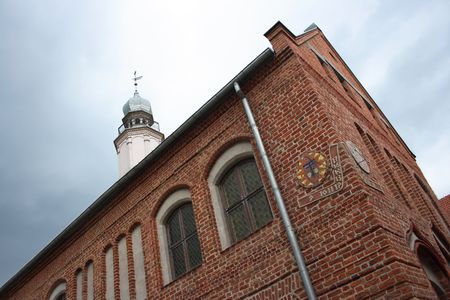 Corner of the building with sundialの写真素材