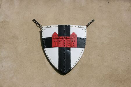 Medieval knight's shield with cross and castle as crestの写真素材