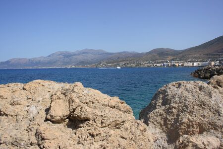 Rock shore of Mediterranean Sea in Hersonissos, Creteの写真素材