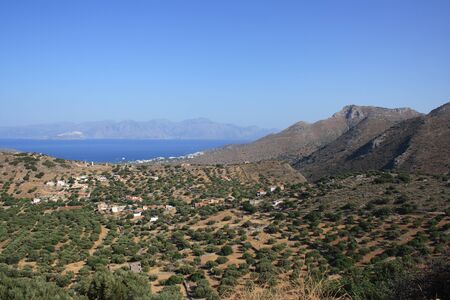 Panorama of Spinalonga Bay with olive grove, Crete, Greeceの写真素材