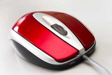 Close-up of red computer mouseの写真素材