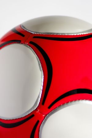 Red soccer ball on a white backgroundの写真素材