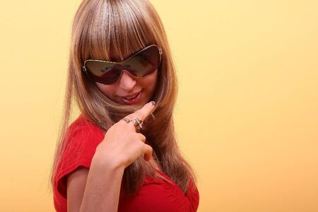 beauty girl on a yellow backgroundの写真素材