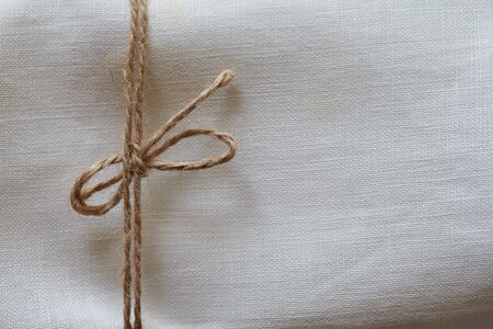 Twine tied in a bowの写真素材