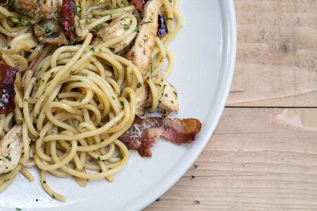 Fusion food - Spicy spaghetti with bacon and basil.の写真素材