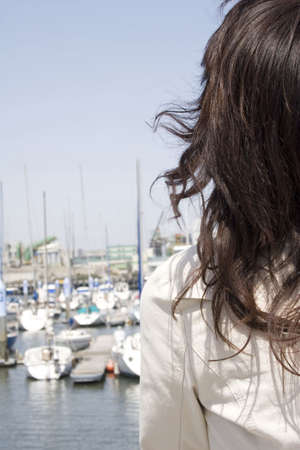 Harbor and womanの写真素材