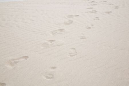 Footprints left on a beach