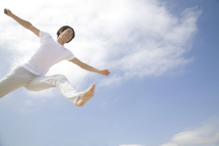 Jumping Japanese manの写真素材