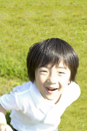 Child on the grasslandの写真素材
