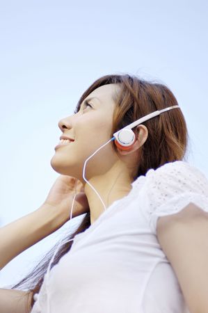 Woman who listento the musicの写真素材