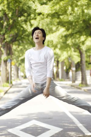 Japanese man hoppingの写真素材