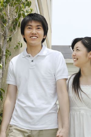 Couple joining handsの写真素材