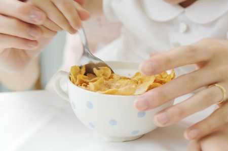 Infant who eats a corn flake