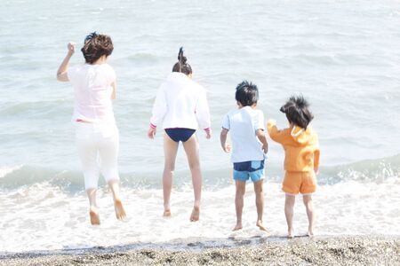 Businessman straightening up a jacketの写真素材
