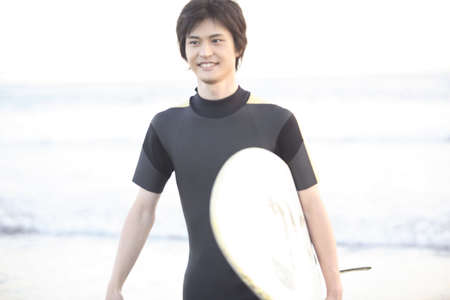 Japanese surfer in Enoshima beachの写真素材