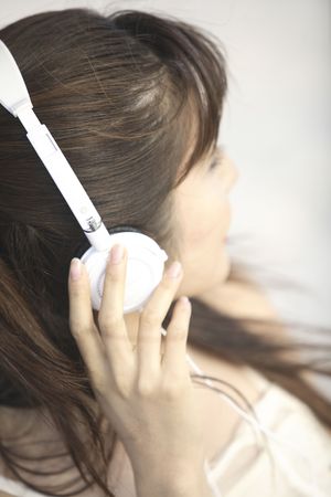 Japanese woman listening to musicの写真素材