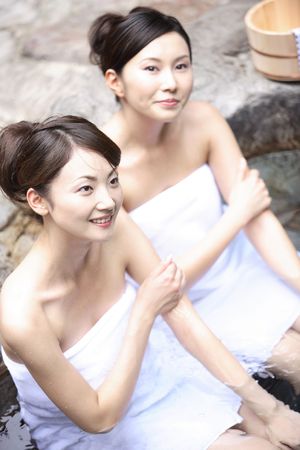 Japanese women in a open-air bathの写真素材