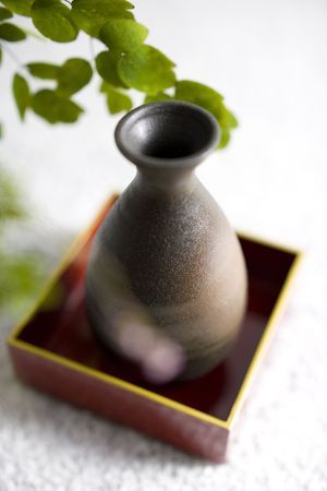 Thalictrum rochebrunianum and Sake bottleの写真素材