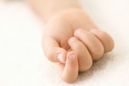 Hand of Japanese babyの写真素材