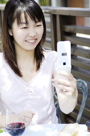 Woman seeing a cell phoneの写真素材