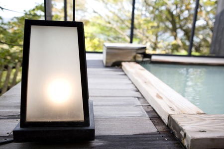 Sum lamp placed on the side of the open-air bathの写真素材