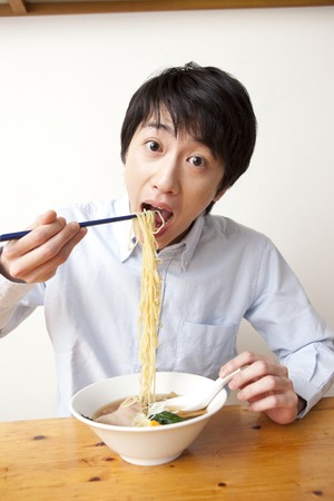 Men who eat soy sauce ramenの写真素材