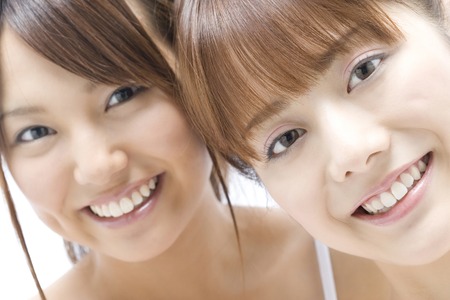 Two beautiful Japanese women's portraitの写真素材