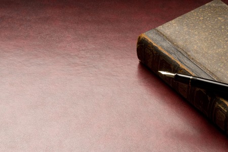 Antique book and pen