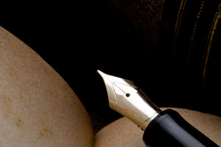 Antique book and pen