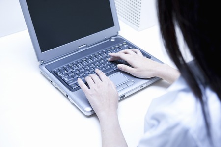 Woman to the keyboard inputの写真素材