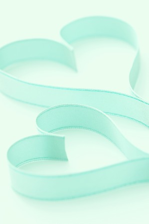 Two ribbons at the heart-shaped.の写真素材
