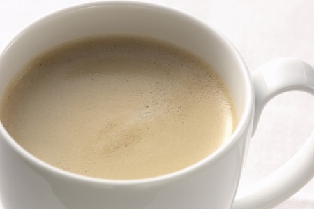 A cup of coffee with a milk.の写真素材