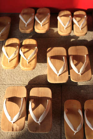 A lot of Japanese wooden clogs are in line.の写真素材