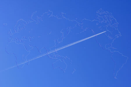 A jet stream cloud on the blue sky.の写真素材