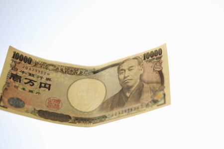 A peper money and white background.