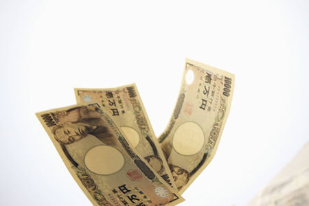 Some paper money and white background.の写真素材