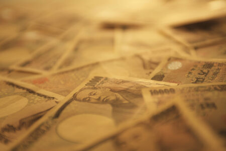 A lot of paper money on the floor.の写真素材