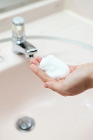 Hand of the person who washes it with a bubble.の写真素材