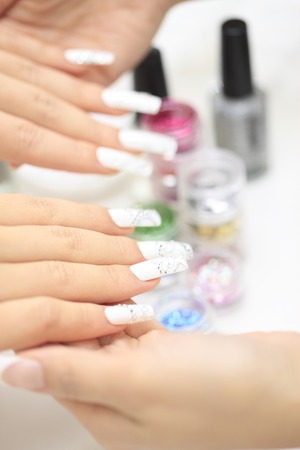 The hands by which nail art was done.の写真素材