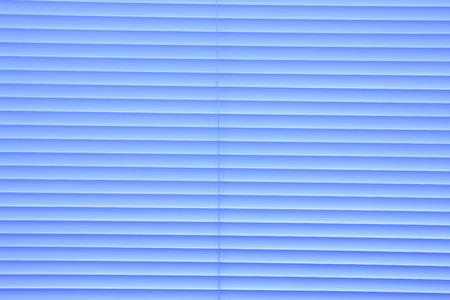 The surface of the blue blind curtain.の写真素材