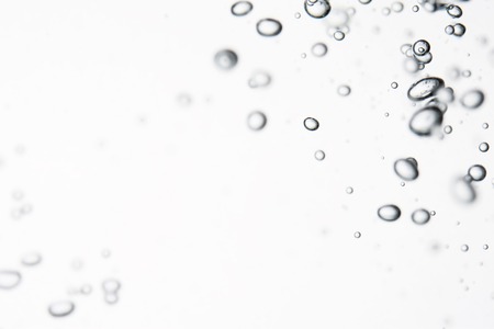 A lot of bubbles in the water.の写真素材