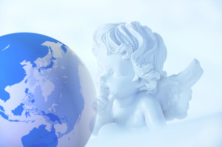 Angels and globeの写真素材