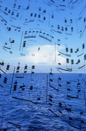 Sheet music and the seaの写真素材