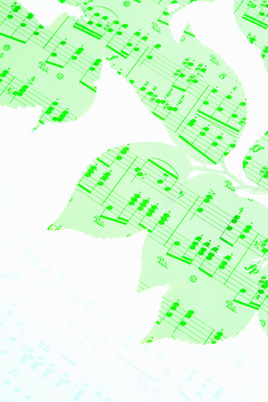 Sheet music and fresh greenの写真素材