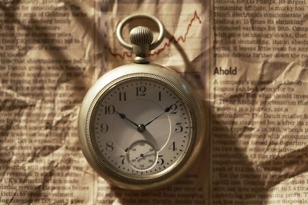 Pocket Watch and newspaperの写真素材