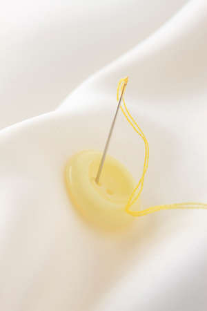 Buttons and thread and needlesの写真素材